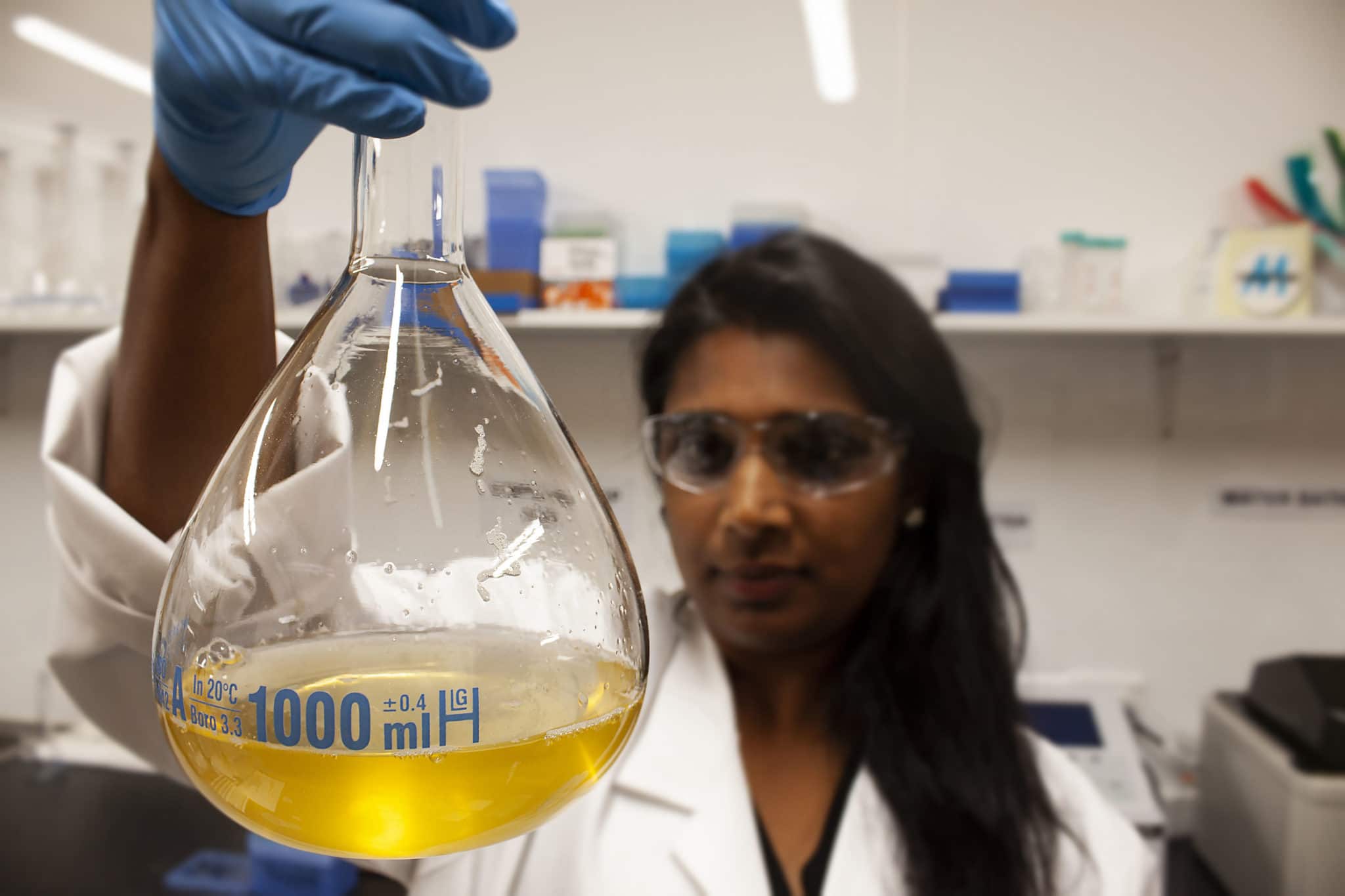 Laboratory technician testing honey